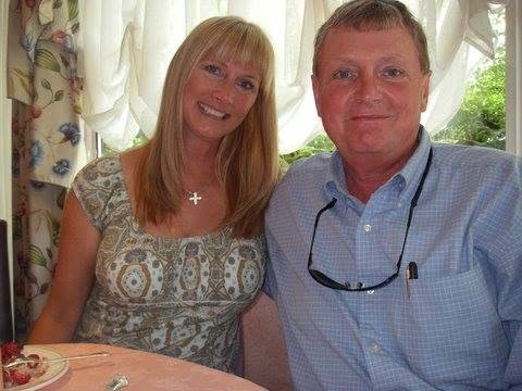 A smiling couple seated together